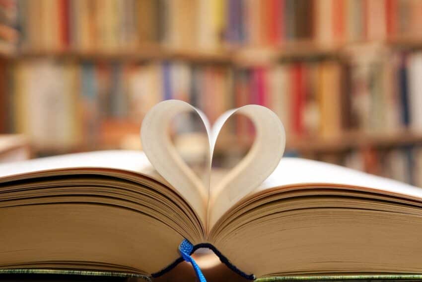 a book opened and pages in the form of a heart