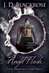 man without shirt stands in fire ring